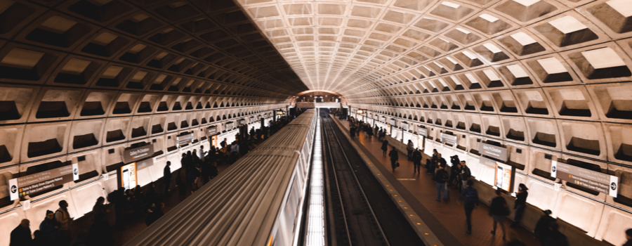 Image of the DC metro train at a station with roof lit up with lights