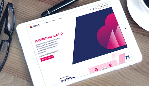 a white tablet on a text showing a screenshot of acquia marketing cloud webpage