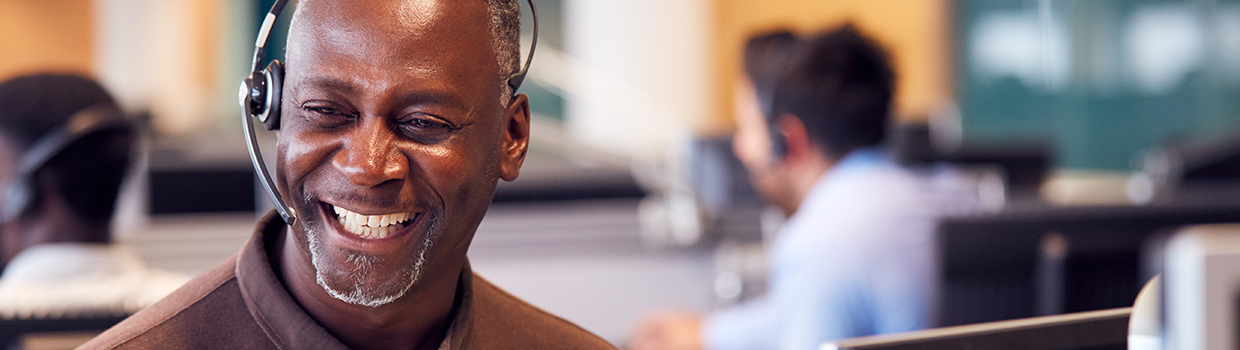 customer service representative smiling while at work