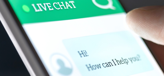 blog banner image showing a mobile phone with a chat bot conversationn